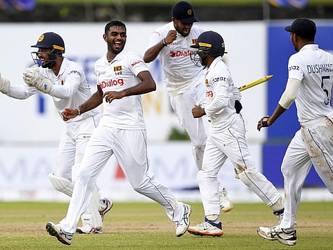 Sri Lanka's Lasith Embuldeniya (second left) and teammates celebrate their victory over West Indies in the first Test match at Galle on Thursday.