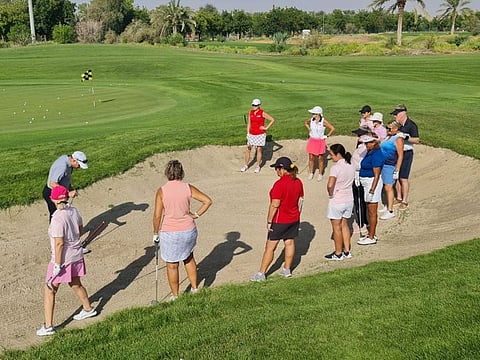 Our ladies receiving instruction in the Golf Clinic hosted by Steve Johns at Al Ain Equestrian, Shooting and Golf Club.