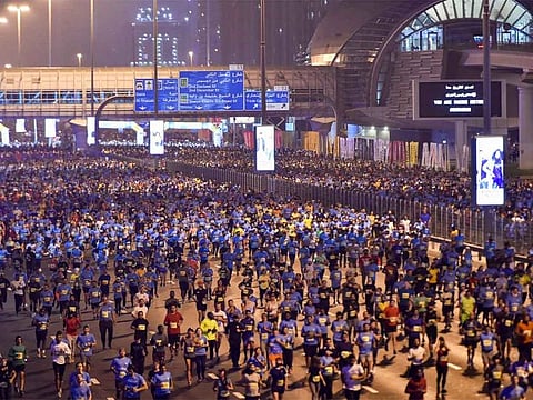 Participants at the Dubai Run 30x30 on Shaikh Zayed road, which has a 5km route designed specifically for families and a 10km route for recreational and professional runners.