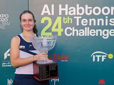 Daria Snigur with the Al Habtoor Tennis Challenge trophy