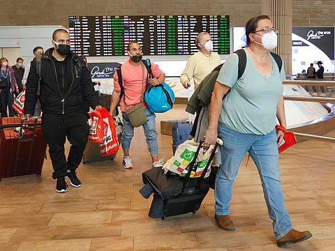 Ppassengers walk upon their arrival at Ben Gurion Airport near Lod in a file photo.
