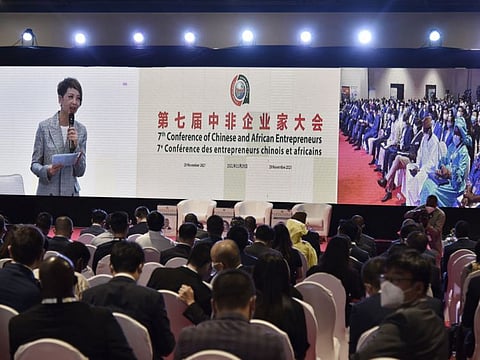Chinese delegates follow the proceedings via a videolink during the China-Africa Cooperation (FOCAC) meeting at the Diamniadio in Dakar, Senegal, on November 29, 2021.