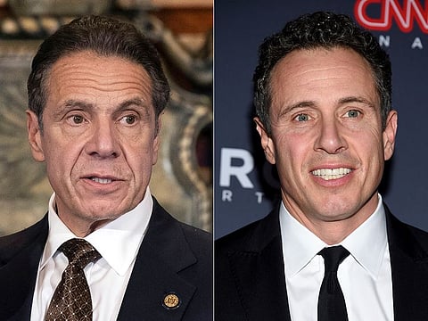 Former New York Gov. Andrew Cuomo, left, and his brother CNN anchor Chris Cuomo.