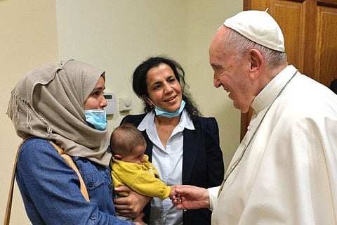 Pope Francis meeting migrants at the Apostolic Nunciature in Nicosia, Cyprus, on December 3.