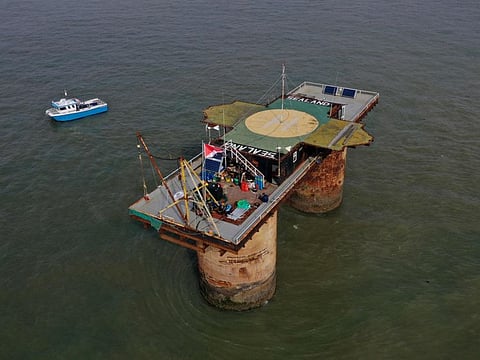 An aerial image shows the Principality of Sealand, some 11 kilometres off the coast of southeast England, on September 16, 2021. It's a hulking metal-and-concrete platform in the North Sea that has been run as an independent micronation in defiance of the UK government for the last 54 years.