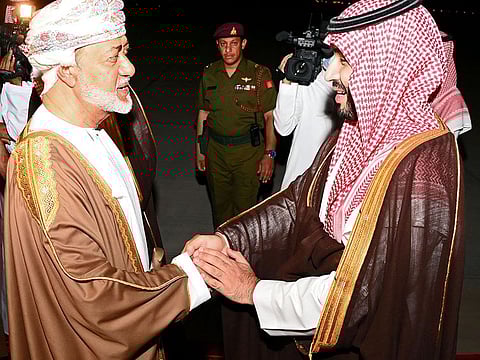 Oman's Sultan Haitham bin Tariq greets Crown Prince Mohammed bin Salman at the airport on Monday night.