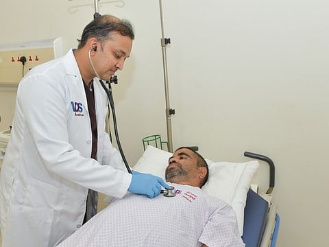 Nitesh Sadanand Madgaocar with Dr Niyas Khalid at the Burjeel Medical City in Abu Dhabi.