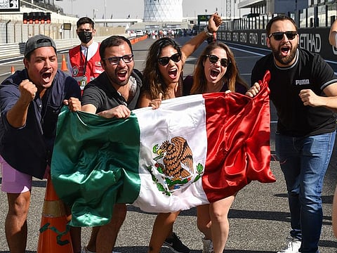 Fans on the start-finish line at Thursday's Yas Marina Circuit Pit-Lane Walk