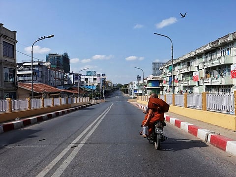 An almost empty road is seen as locals stage a "silent strike" in Mandalay, Myanmar December 10, 2021.
