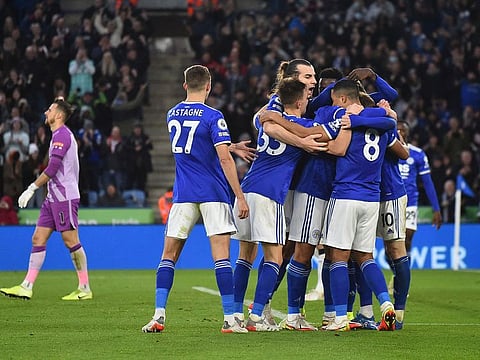 Leicester City's Youri Tielemans celebrates with teammates after scoring their third goal.