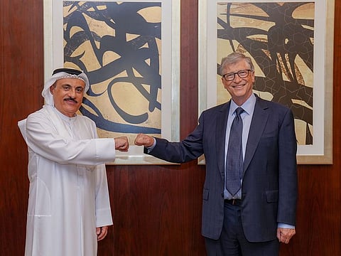 Mohamed Ali Al Ansari (left) and Bill Gates during their meeting in Dubai on Sunday