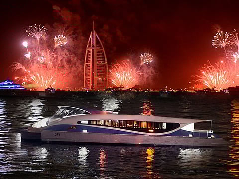 File photo of Dubai Ferry riders enjoying New Year's Eve fireworks show at Burj Al Arab from the sea
