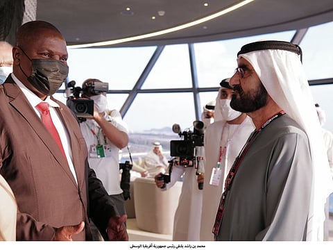 Sheikh Mohammed bin Rashid with Faustin-Archange Touadera on the sidelines of the final round of the Formula 1 Etihad Airways Abu Dhabi Grand Prix 2021.