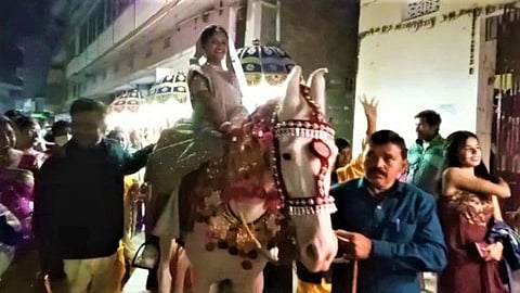 Anushka Guha, an airhostess with Indigo airlines, led a wedding procession to a prominent city hotel to receive her groom Jeet Mukherjee and bring him to the wedding venue to conduct the remaining marriage rituals.