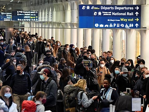 Passengers queue to board Eurostar trains at St. Pancras International station, ahead of increased restrictions for travellers to France from Britain, amid the spread of COVID-19, in London, on December 17, 2021.