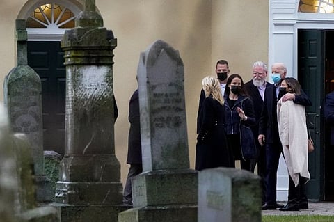 President Joe Biden, first lady Jill Biden and other family members leave St. Joseph on the Brandywine Catholic Church on the anniversary of the deaths of the president's first wife, Neilia, and daughter Naomi, in Wilmington, Delaware on December 18, 2021.
