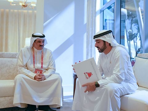 Sheikh Hamdan bin Mohammed bin Rashid Al Maktoum (right) and the Ambassador of Bahrain to the UAE, Sheikh Khalid bin Abdullah bin Ali Al Khalifa, during their meeting on Sunday at Expo 2020 Dubai