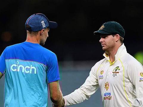Australia's captain Steve Smith shakes hands with England's Joe Root