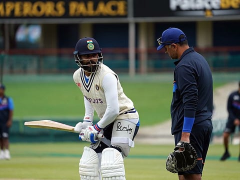 Rahul Dravid, head coach of Team India, with Test captain Virat Kohli during a practice session ahead of the first Test at Super Sport Park in Centurion.