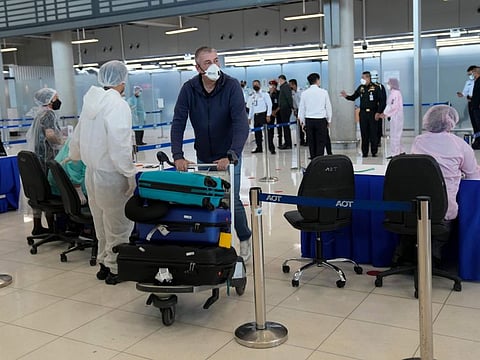 Tourists arrive at Suvarnabhumi International Airport in Thailand.