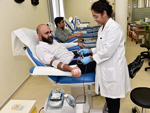 Jolamma Varghese Sebastian at the blood donation centre in Latifa Hospital to mark World Blood Donation Day, earlier. Sebastian passed away last Monday.