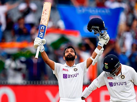 Ajinkya Rahane celebrates his century against Australia in Melbourne