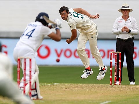 Australia's Mitchell Starc bowls to India's Hanuma Vihari during play on day two of the second test between them at the Melbourne Cricket Ground, on Sunday.