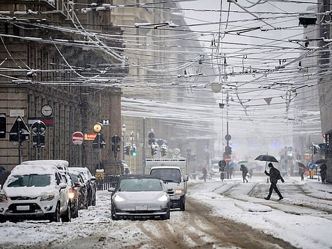 A view of a street in central Milan, Italy, after a snowfall.