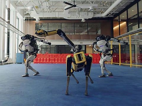 Spot and Atlas robots dance during a year-end video by the robotics company Boston Dynamics.