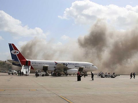 Dust rises after explosions hit Aden airport, upon the arrival of the newly-formed Yemeni government in Aden, Yemen December 30, 2020.