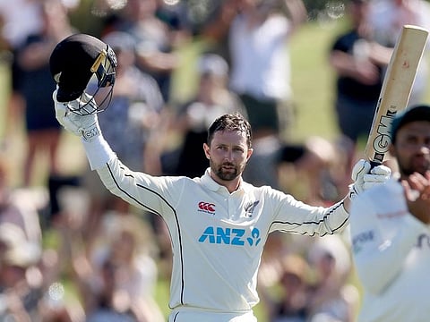 Devon Conway of New Zealand celebrates his century during first day of the first Test against Bangladesh at Bay Oval in Mount Maunganui, New Zealand, Saturday.