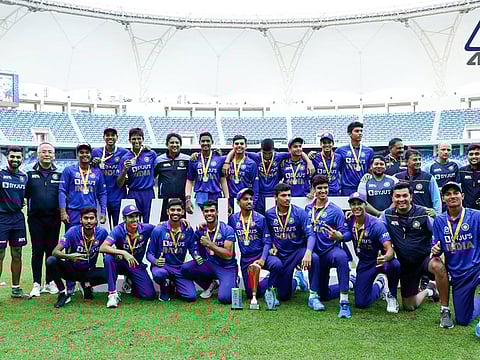 One for the album: Under-19 Indian cricket team with the Asia Cup at the Dubai International Stadium on Friday.