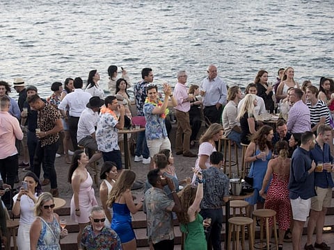 Visitors gather at Opera Bar during New Year's Eve celebrations in Sydney.