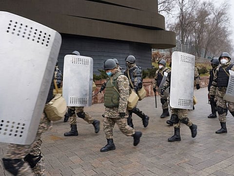 Security forces keep a strict vigil on the streets in Kazkhstan.