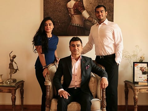 Mahesh Advani with his daughter Manisha and son Sanjit