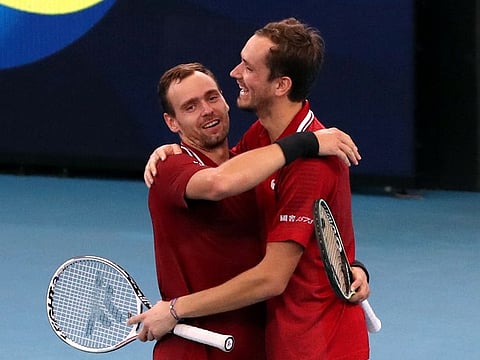 Russia's Daniil Medvedev and Roman Safiullin celebrate after winning their group stage doubles match against Italy in the ATP Cup on Thursday.