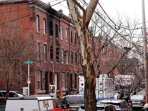 Soot covers the exterior wall of the building of Wednesday's fatal fire in the Fairmount neighbourhood of Philadelphia.