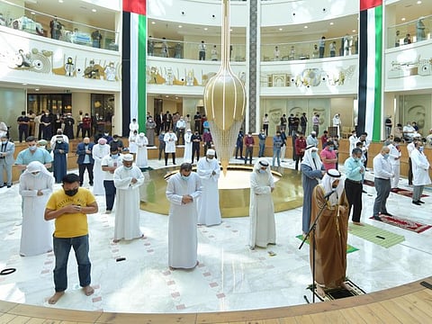 Patients and healthcare workers offering Friday prayer at Burjeel Medical City in Abu Dhabi