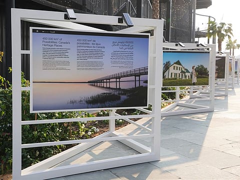 Exhibit outside the Canada Pavilion on Monday featuring the country's vast network of heritage places and natural parks.