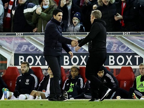 Nottingham Forest manager Steven Cooper shakes hands with Arsenal's Mikel Arteta