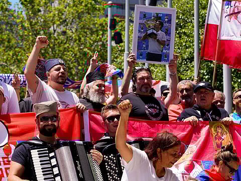 Supporters of Novak Djokovic rally outside the Federal Court of Australia, while the star athlete is in the midst of a legal battle over his visa status.