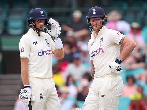 England's captain Joe Root (left) wants Chris Silverwood to remain as head coach despite the Ashes defeat in Australia this winter.