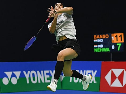 Malvika Bansod leaps for an overhead smash en route to her upset win over Saina Nehwal in Yonex India Open on Thursday.