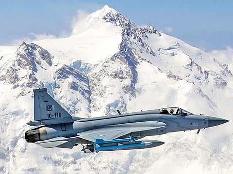 Pakistan Air Force JF-17 Thunder flying over Nanga Parbat mountain.