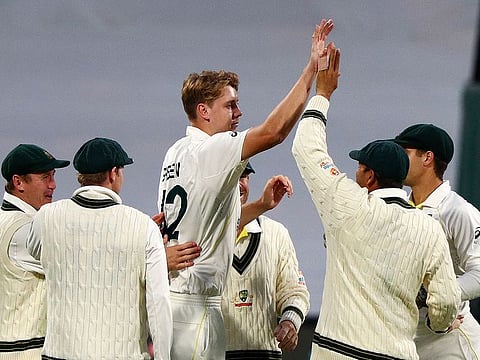 Australia's Cameron Green celebrates with teammates as England crumble