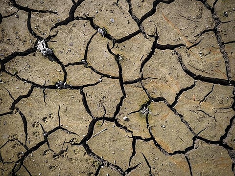 The cracked soil of the dryed bed of the Brenet Lake (French: Lac des Brenets) part of the Doubs river, a natural border between eastern France and western Switzerland in Les Brenets. - The last seven years have been the hottest on record globally "by a clear margin", the European Union's climate monitoring service reported on January 10, 2022, as it raised the alarm over sharp increases in record concentrations of methane in the atmosphere.