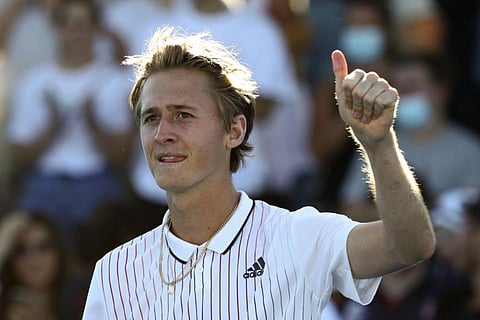 Sebastian Korda of the US reacts after defeating Corentin Moutet of France in the second round at the Australian Open on Wednesday.