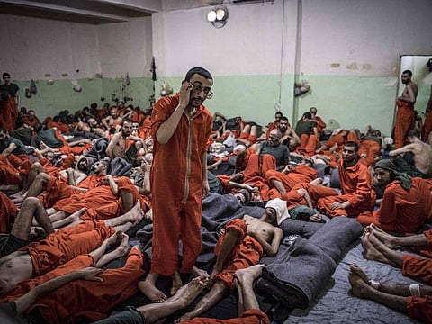 Men suspected of being affiliated with the Daesh terror group in a cell of the Sinaa prison in the Ghwayran neighbourhood of the northeastern Syrian city of Hasakeh. The Daesh group attacked a Kurdish-run jail in northeast Syria on Thursday, freeing fellow terrorists, a war monitor reported without specifying how many escaped.