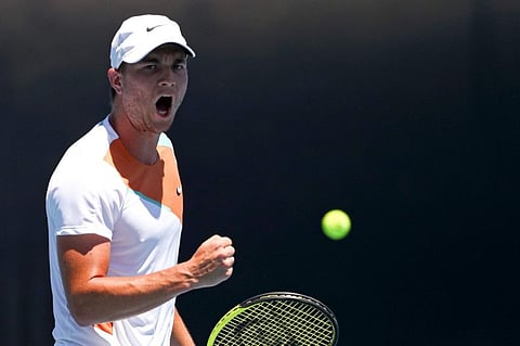 Miomir Kecmanovic of Serbia reacts during his third round match against Lorenzo Sonego of Italy at the Australian Open tennis championships in Melbourne, Australia.