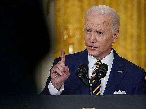 US President Joe Biden speaks during a press conference on the eve of his first year in office, from the East Room of the White House in Washington, DC on January 19, 2022. - President Joe Biden holds a rare press conference Wednesday to kick off his second year in office, hoping to reset the agenda ahead of what could be brutal election reversals for Democrats.
